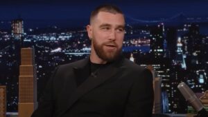 Travis Kelce Put Out A Video Supporting Footlong Cookies, But Fans Can’t Stop Calling Out The Cookie Faker Standing Next To Him